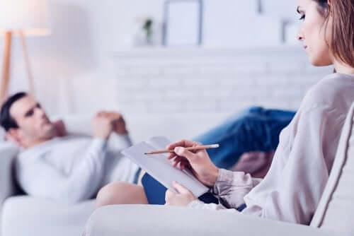 Man on a couch in psychotherapy.