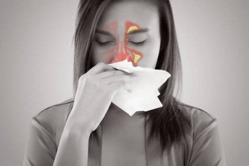 A woman with sinus pain.