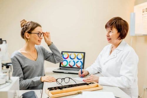Woman with deficient color vision at eye doctor.