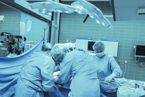 Doctors doing a surgery.
