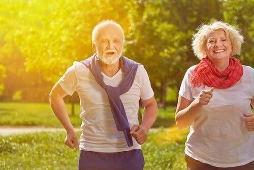 Couple outdoors getting regular physical exercise