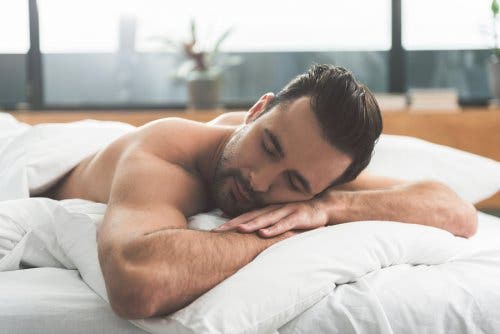Man sleeping on stomach.