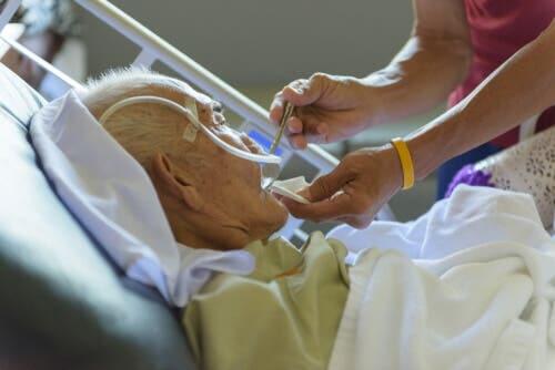 An old man at a hospital.