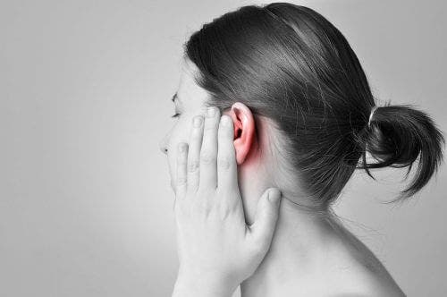 A woman with ear pain.