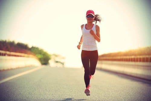 Woman on the street running regular physical exercise