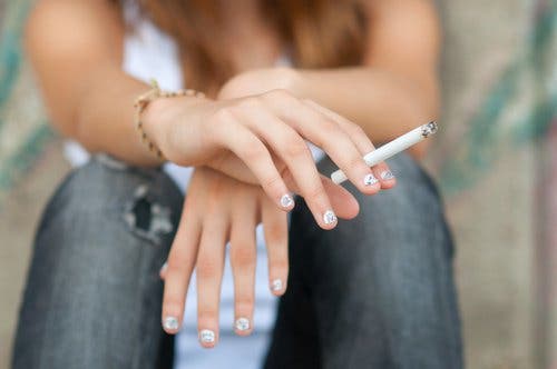 A woman smoking.