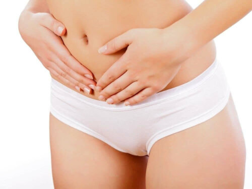 A woman with a belly ache.