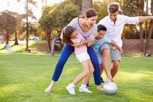 A family playing soccer.