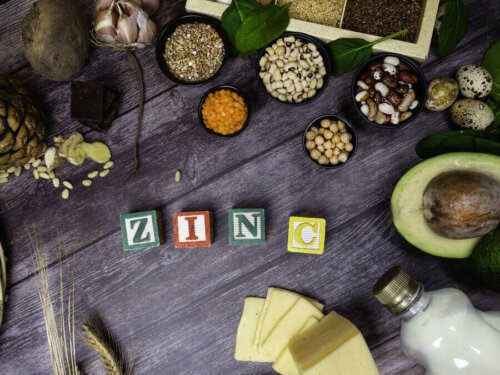 Foods with zinc to boost your immune system around blocks that spell out "zinc".