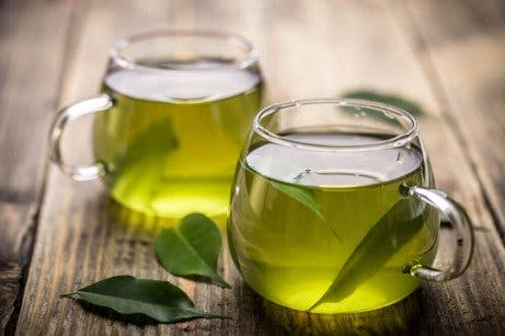 Cups of green tea, a supplement for treating obesity.