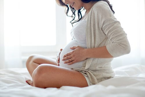 A pregnant woman.