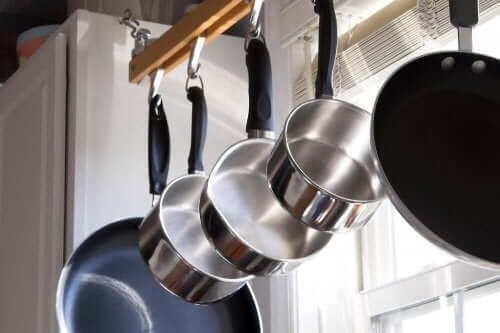 A set of stainless steel pots.