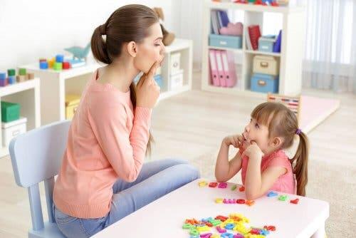 Mom teaching daughter to be bilingual.
