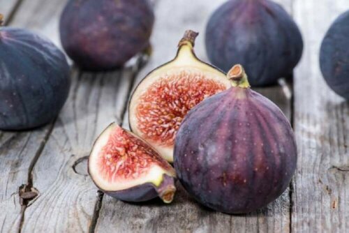 A few figs on a table.