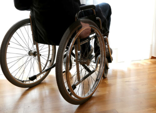 A person in a wheelchair.