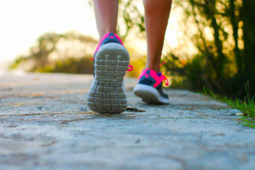 A person walking to prevent the appearance of varicose veins.