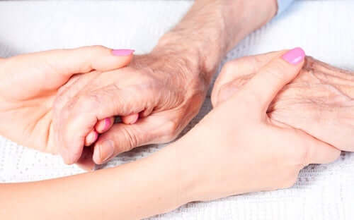 Two people holding hands.