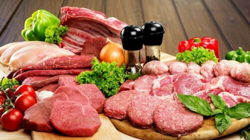 Assorted raw meats on cutting boards, how much meat is safe to eat?
