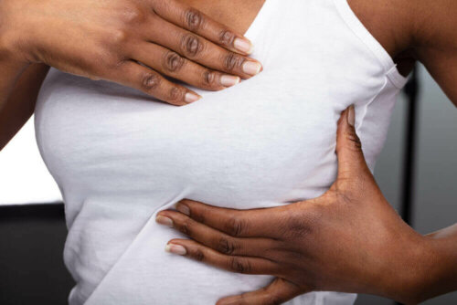 A woman with breast pain.
