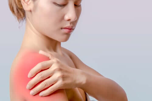 A woman with a sore shoulder.