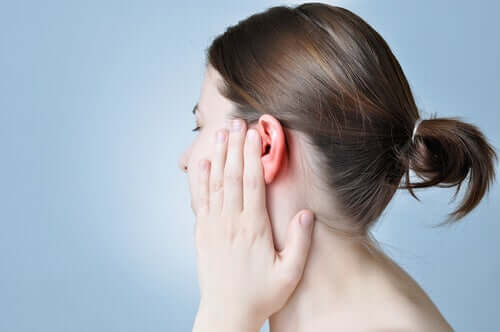 A person with ear pain.