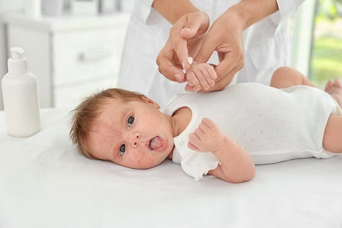 A baby on a mat.