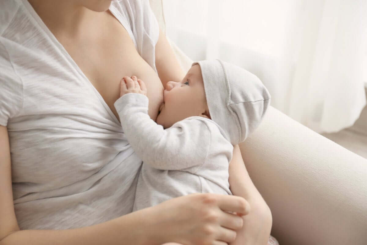 A baby breastfeeding.