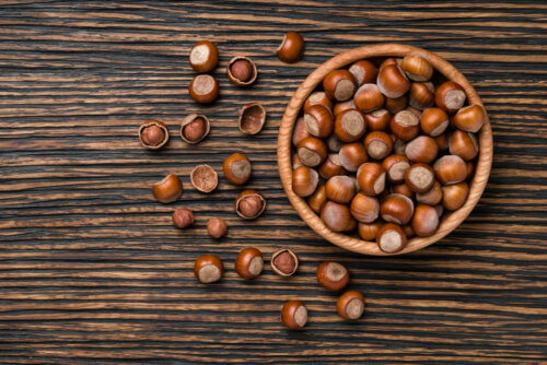 Some hazelnuts in a bowl.