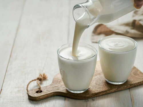 Two glasses of natural yogurt.