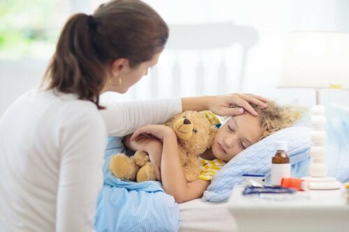 Hives in children can be debilitating. In this photo, a mother taking care of her sick child.