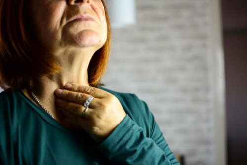 A woman with laryngitis.