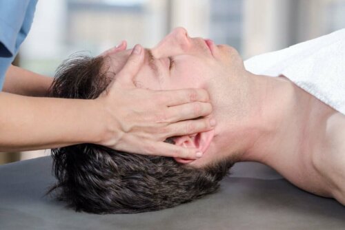 A person getting a jaw massage.