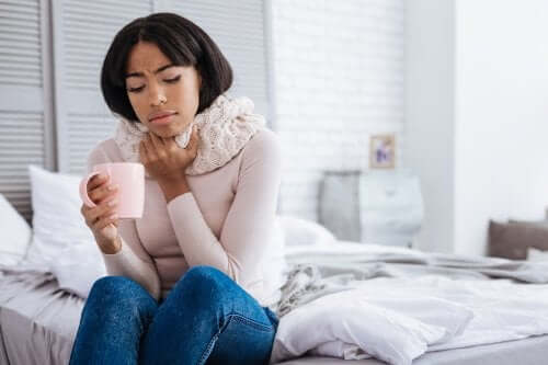 A woman with a sore throat.
