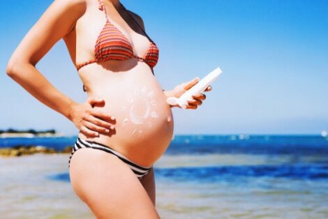 Pregnant woman at beach.