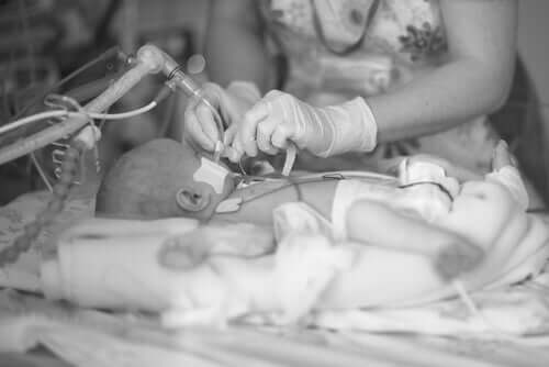A baby with a respiratory disease.
