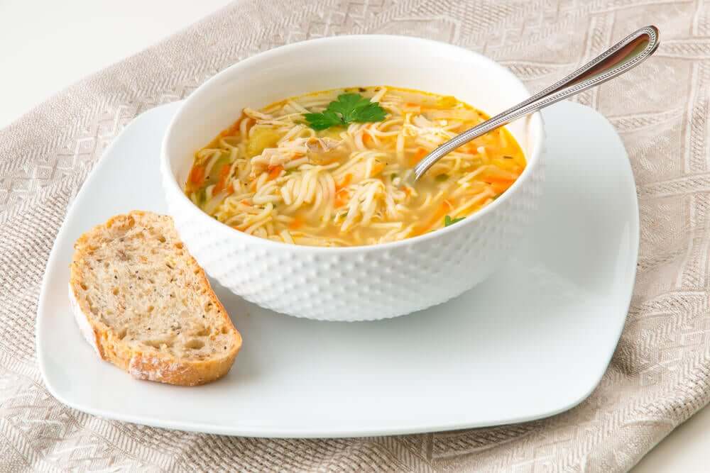 A bowl of chicken noodle soup.