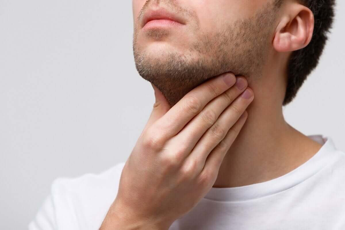 A man with a sore throat.