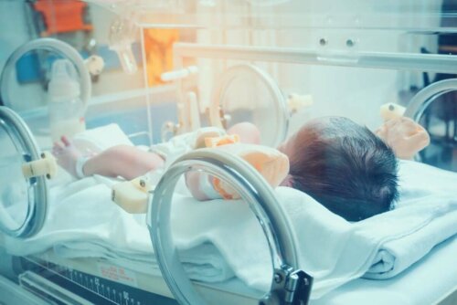 A premature baby in an incubator.