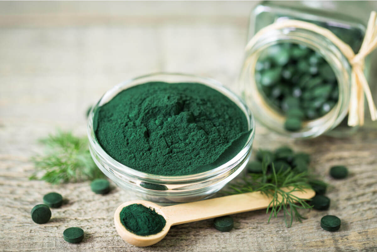 Spirulina in powder and capsule forms.