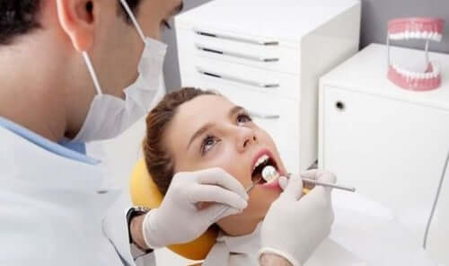 A woman at the dentist.