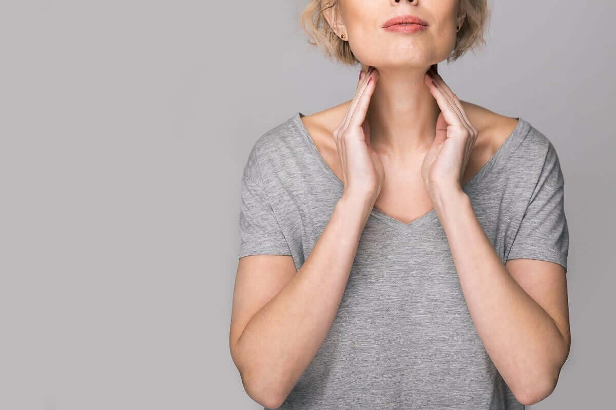 A woman with a sore throat.