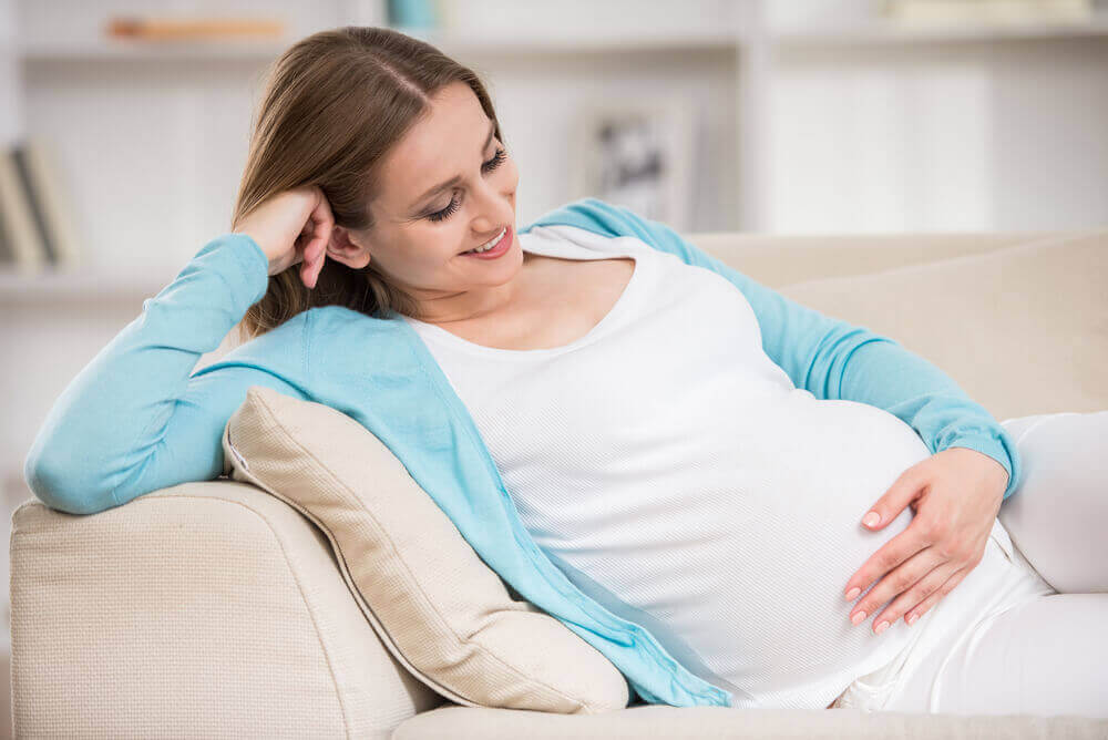 Happy pregnant woman.