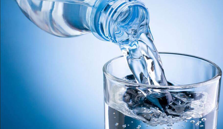 Water in a glass.