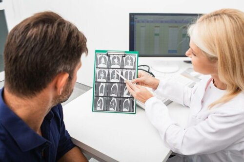 A doctor explaining something to a patient.