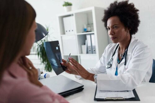 A doctor talking to a patient.