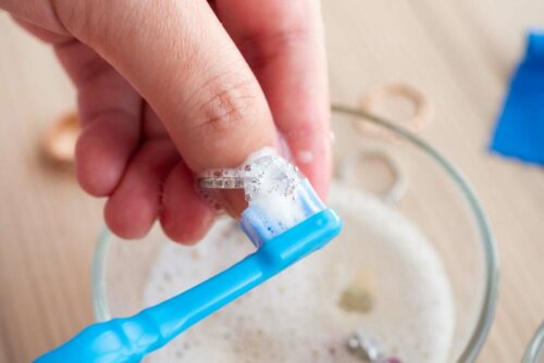 A person washing a ring.