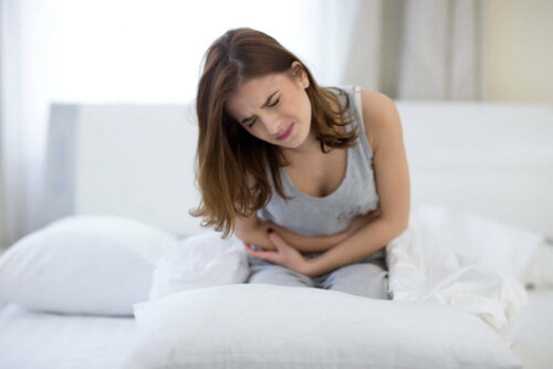 A woman with a stomach ache.