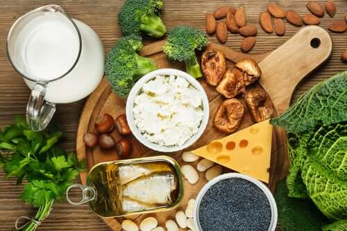 Foods rich in vitamin D, like cheese, oily fish, and milk.
