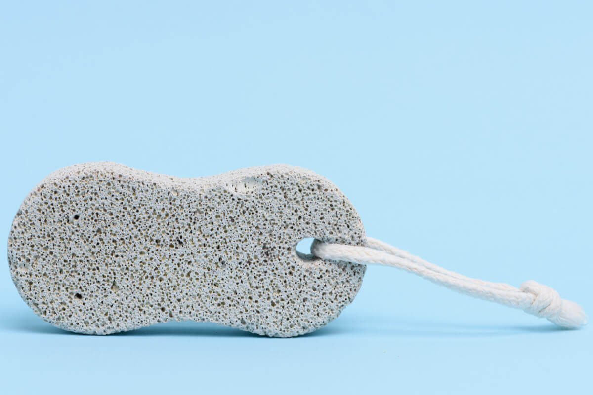 Pumice with string.