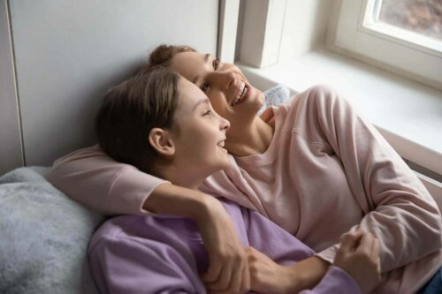 Two women lying down.